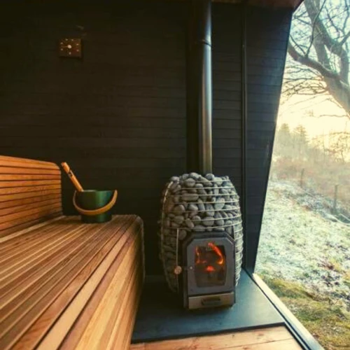 Indoor sauna integrated into a bright modern home wellness space