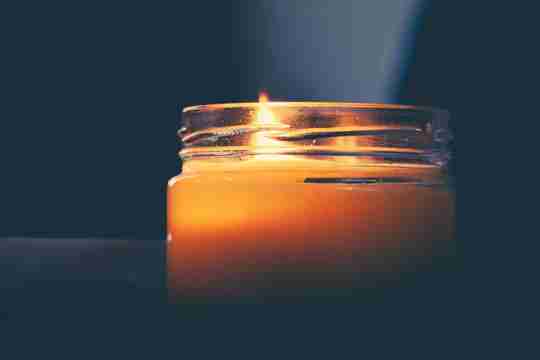 Aromatherapy candle flame in article comparing diffusers vs candles