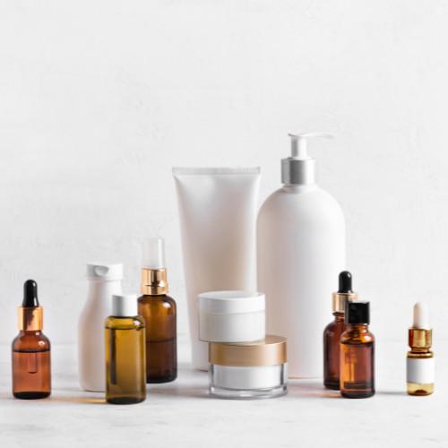 various generic skincare products against a white background.