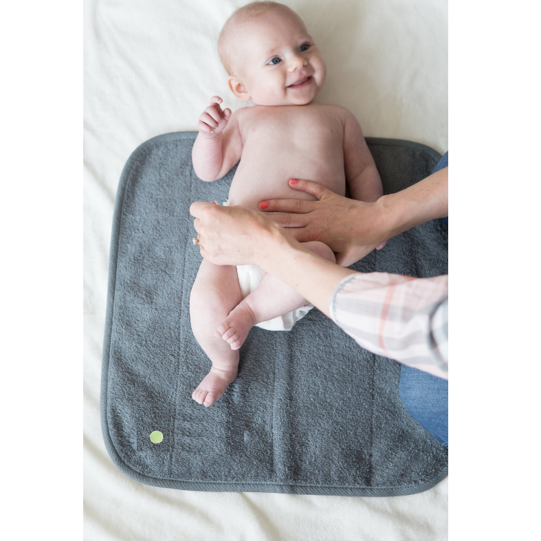 Nappy free time on waterproof bed mat - PeapodMat