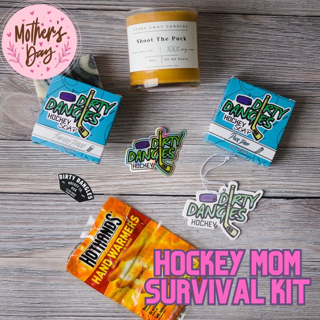 2 dirty dangles hockey soap bars, a soy wax candle, a car air freshener and hand warmers on a wood background with stickers.