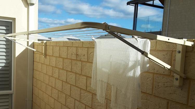 Can I Install a Wall Mounted Clothesline on a Brick Fence?