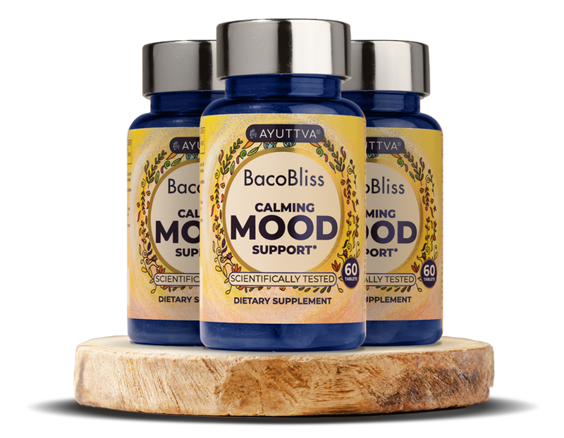 Pack of three bottles of BacoBliss on a wooden podium.