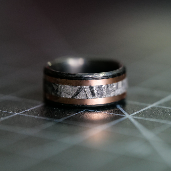 The Carbon Fiber, Rose Gold, and Meteorite Ring is normally crafted with Rose Gold, but can even be made with Yellow Gold