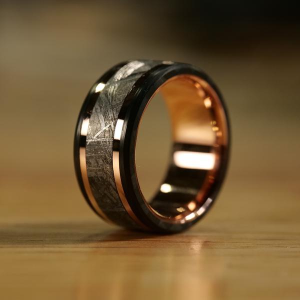 The Meteorite and Carbon Fiber Ring with Gold Liner is a complex handmade ring that can be made with either Yellow Gold or Rose Gold