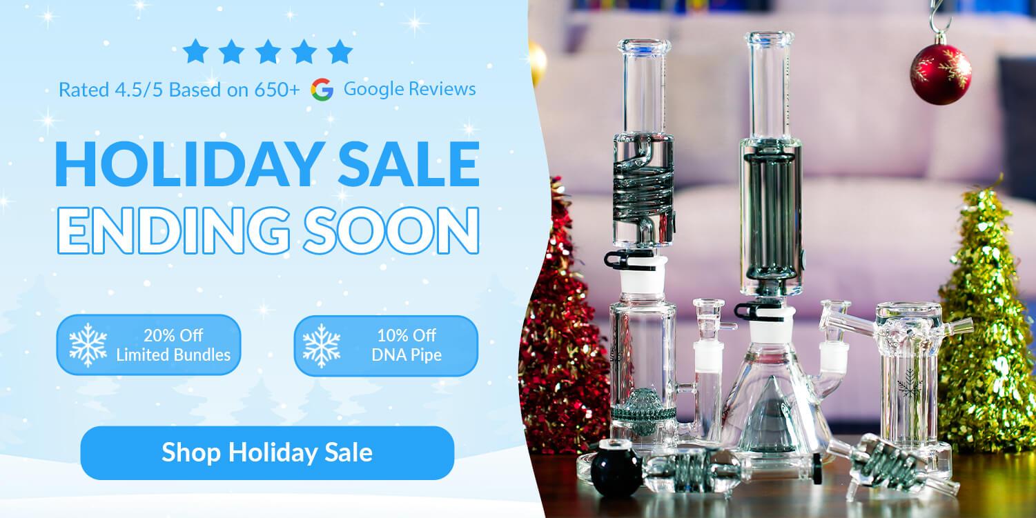 glass bongs on table in front of couch