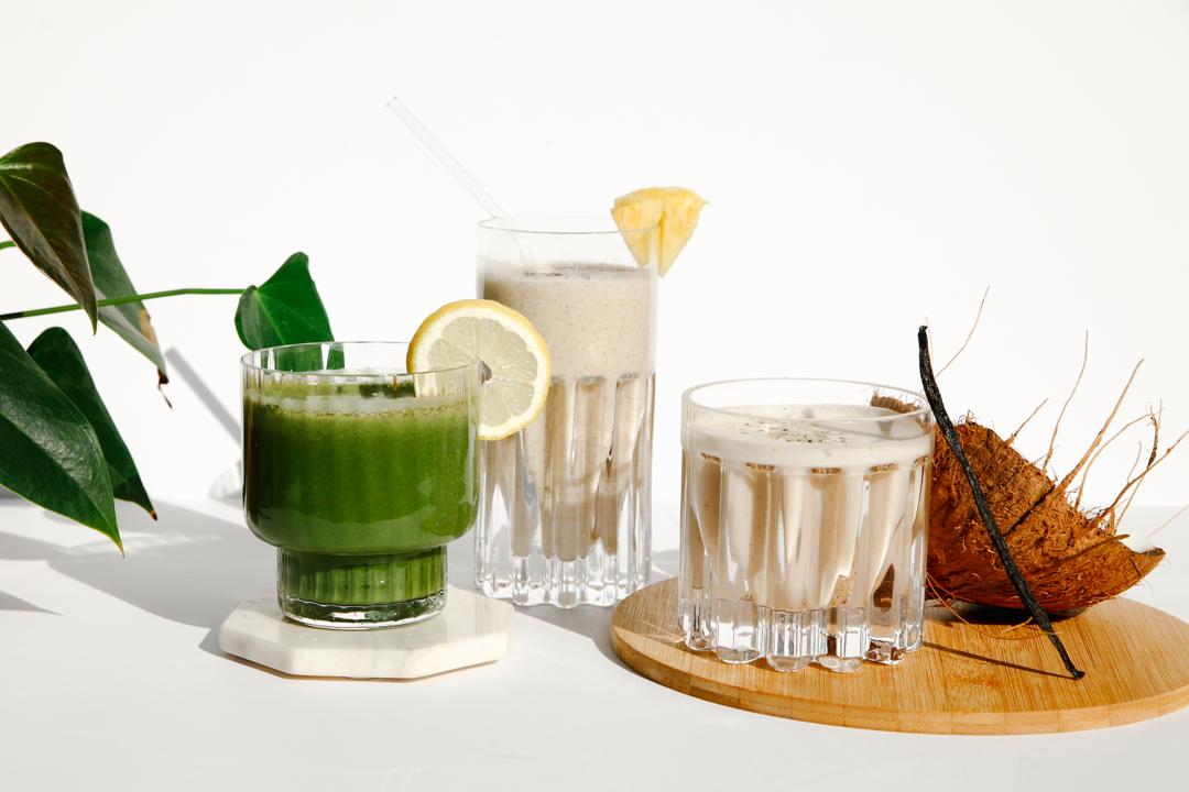 Glasses of Maintenance Cleanse mixed into drinks
