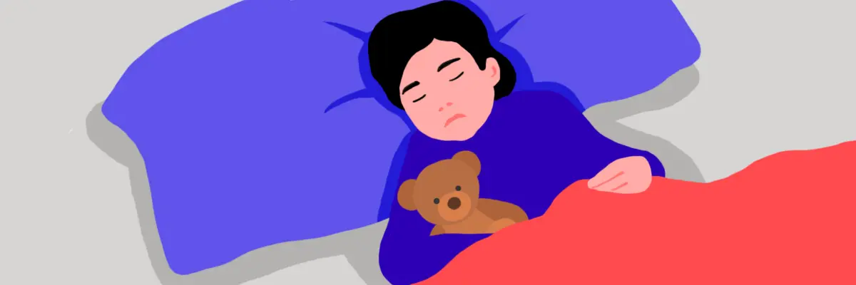 Toddler sleeping soundly with a teddy bear, an age when parents ask when to stop using white noise for baby.