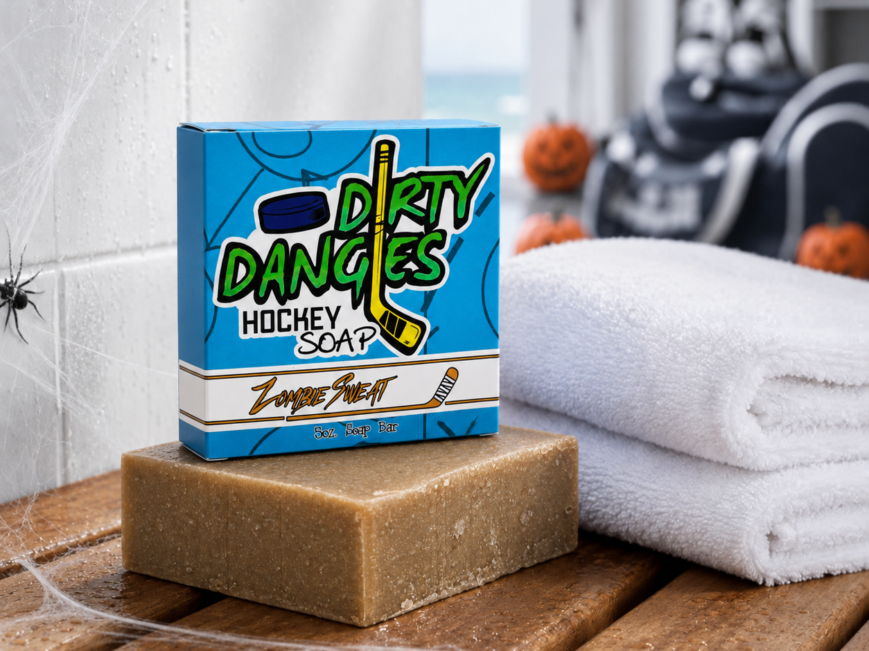 zombie sweat pumpkin spice scented hockey soap bar in a locker room with a towel, hockey gear and halloween decor