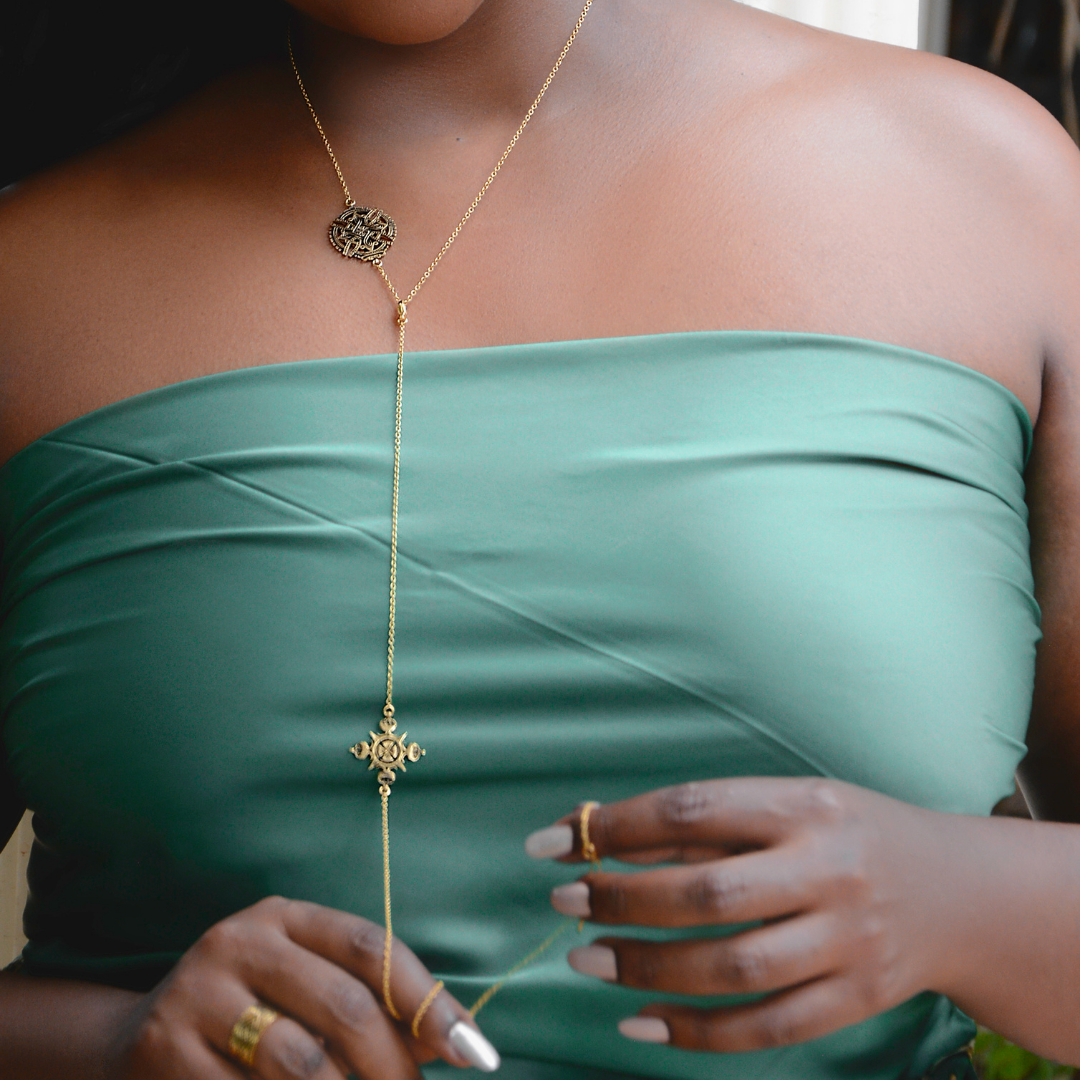 Yenaé Model Wearing Lalibela Cross 14K Gold Plated Necklace As A Body Chain Necklace