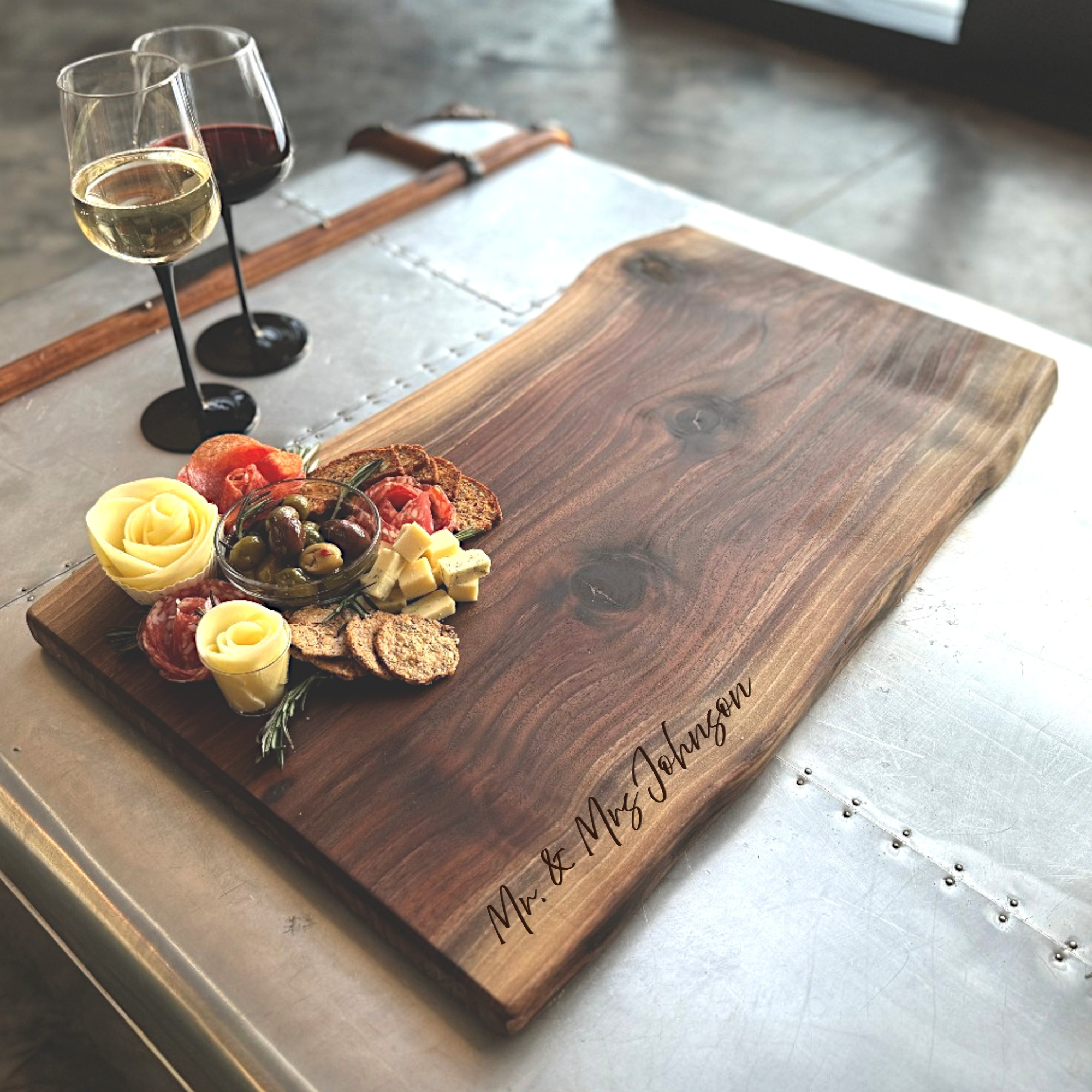 Personalized Live Edge Charcuterie Board with custom engraving.