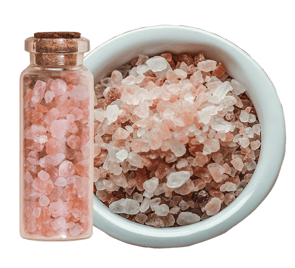 A bowl of Himalayan rock salt surrounded by floral artworks