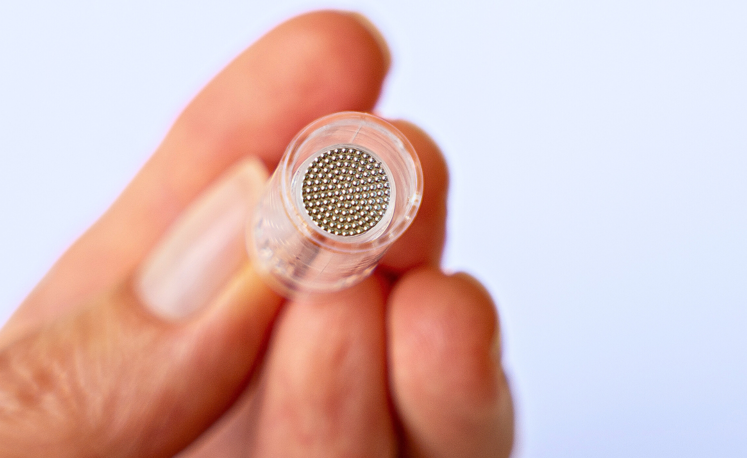 woman holding nano cartridge