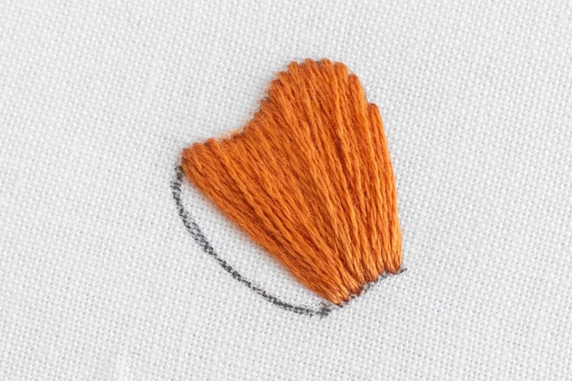 A bigger area of satin stitch has been created.