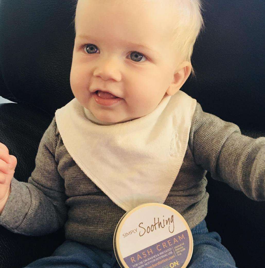 baby with simply soothing rash cream made with zinc oxide
