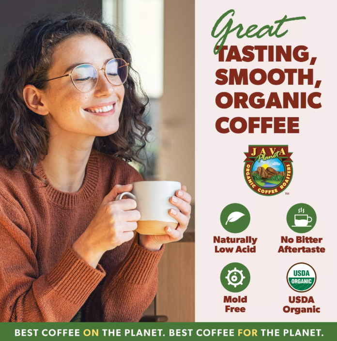 Woman Smiling with a cup of Coffee on her hands