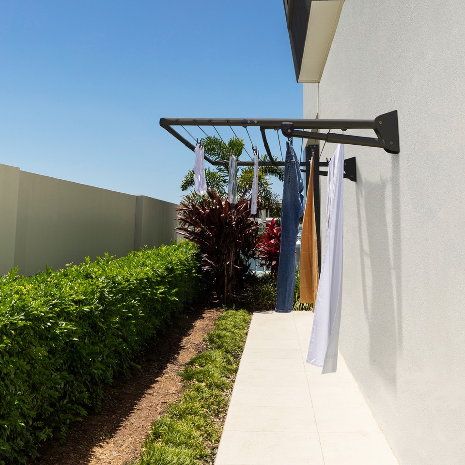 hills folding clothesline installed on brick wall in sutherland shire