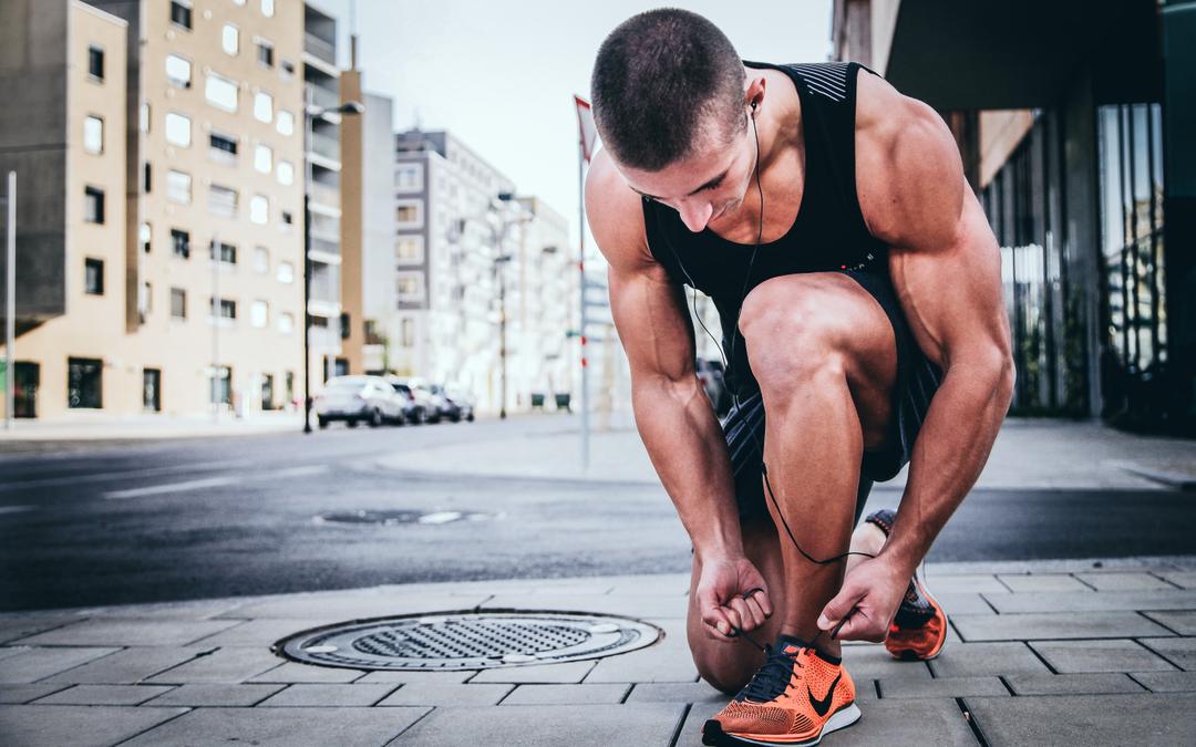 Guy Tying Running Shoes 