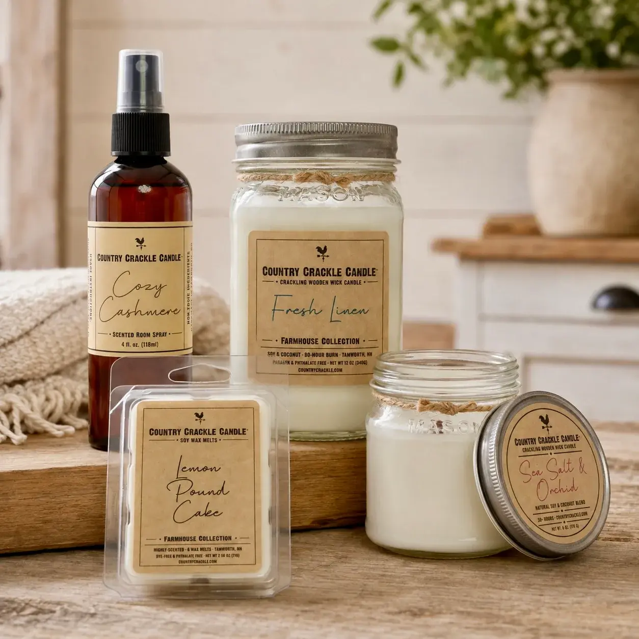farmhouse collection group of products: large soy candle, small soy candle, soy wax melt, scented room spray. Modern farmhouse interior shot.