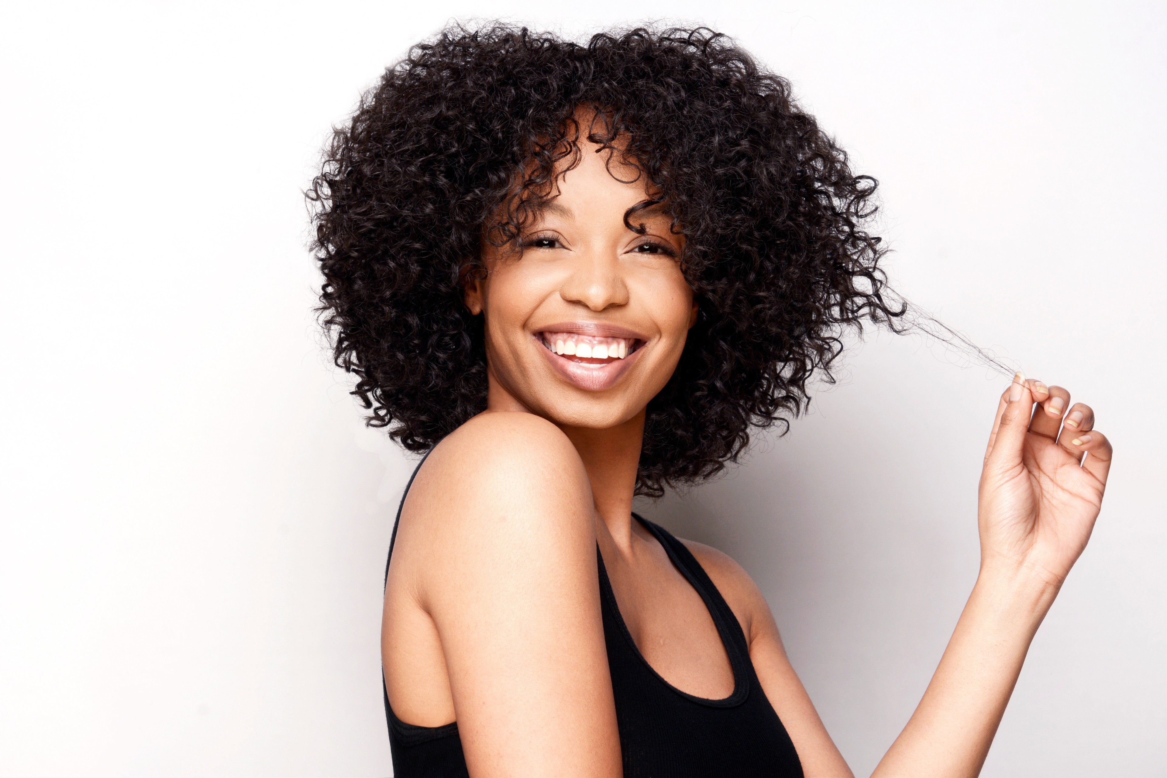 Defined Curls and Coils: 9 Amazing Ways To Beat Frizz – Voice of Hair