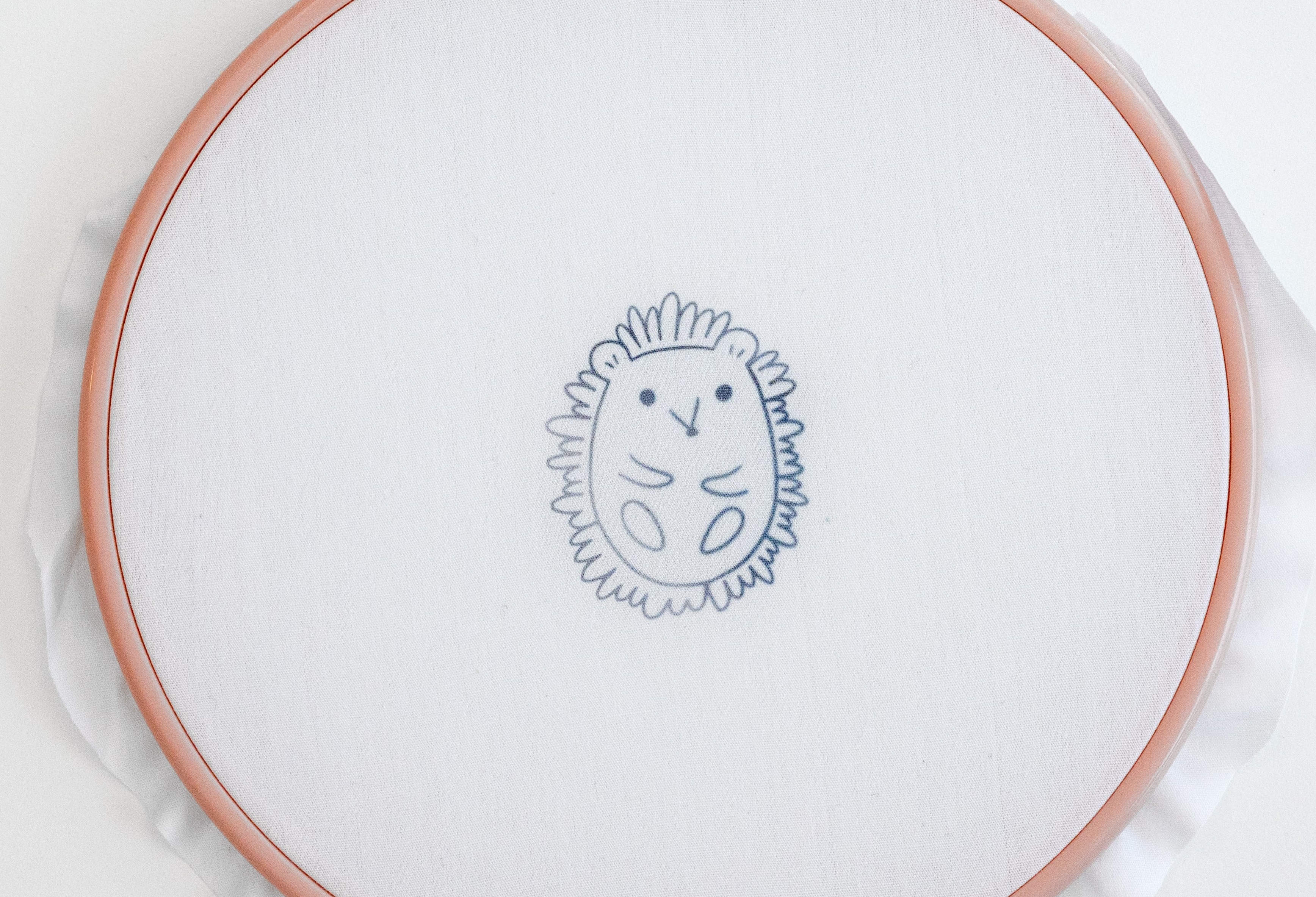 A hedgehog pattern has been transferred onto the hoop.