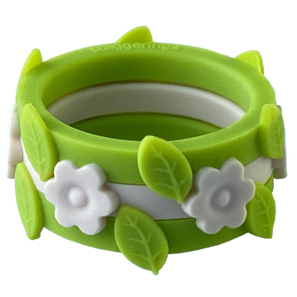 Limon colored leaf silicone rings with a white flower silicone ring.