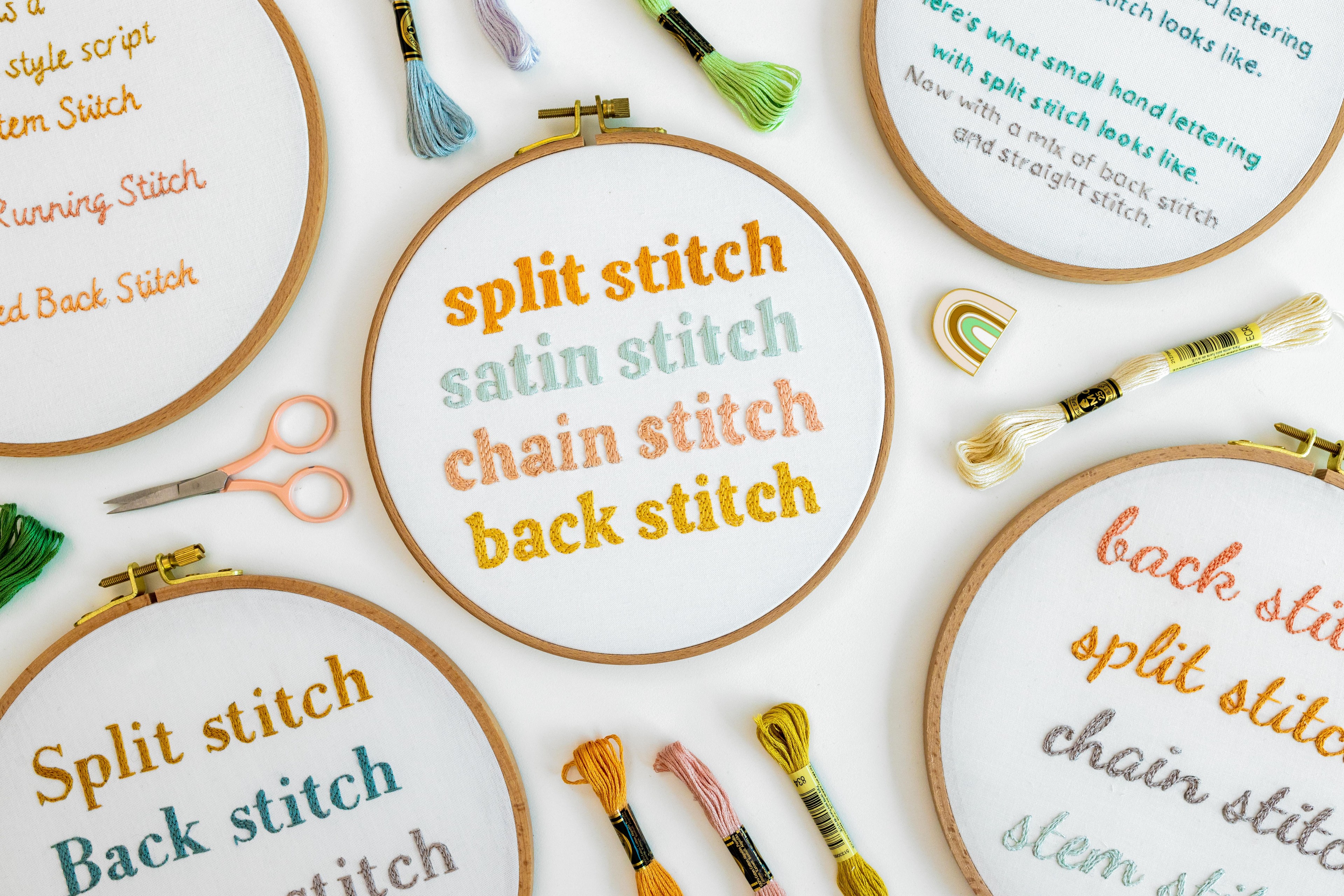 This is an image of different stitches and writing on modern embroidery hoops.