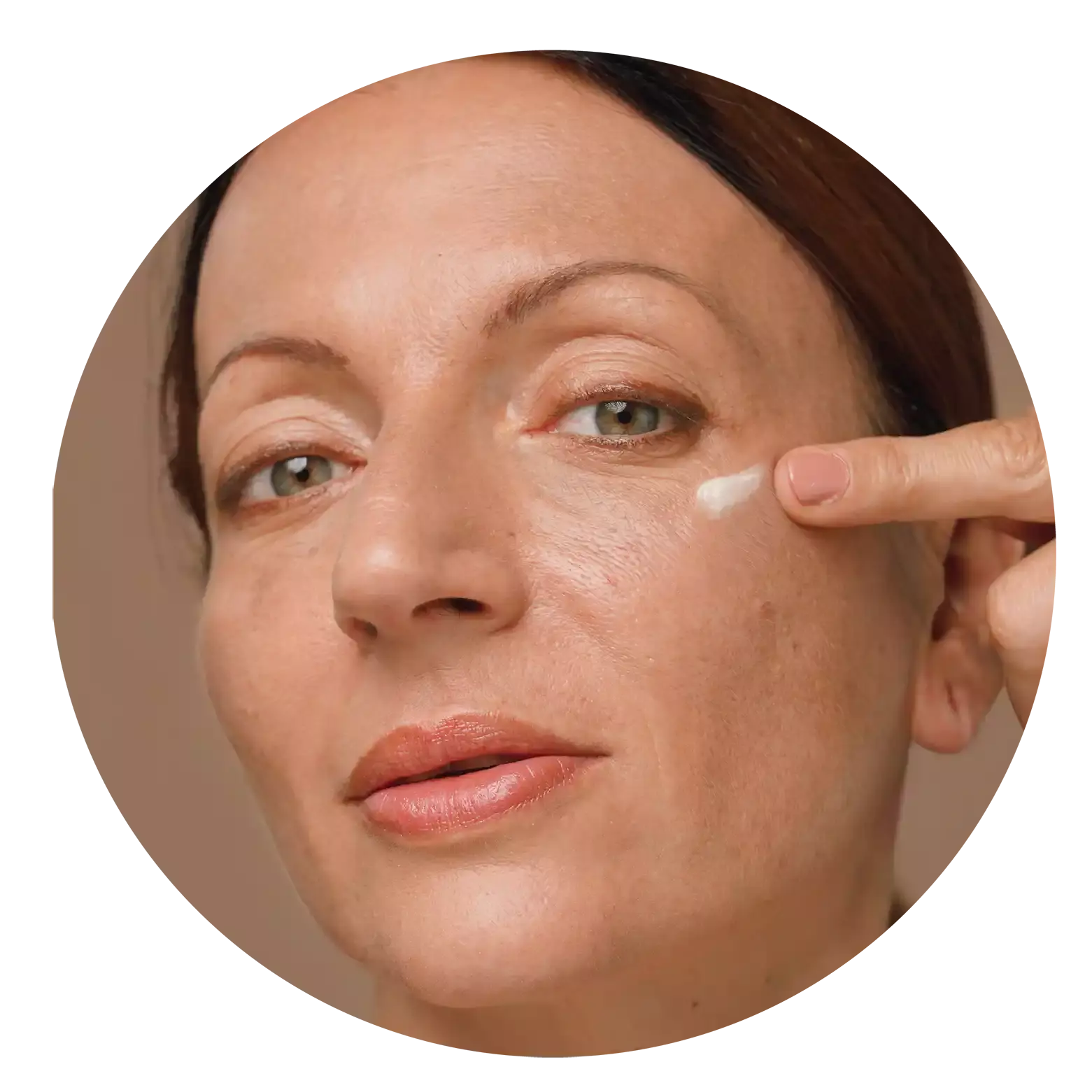 applying serum on face