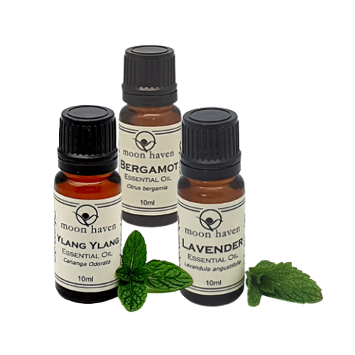 Moon Haven Ylang Ylang, Bergamot and Lavender essential oil bottles