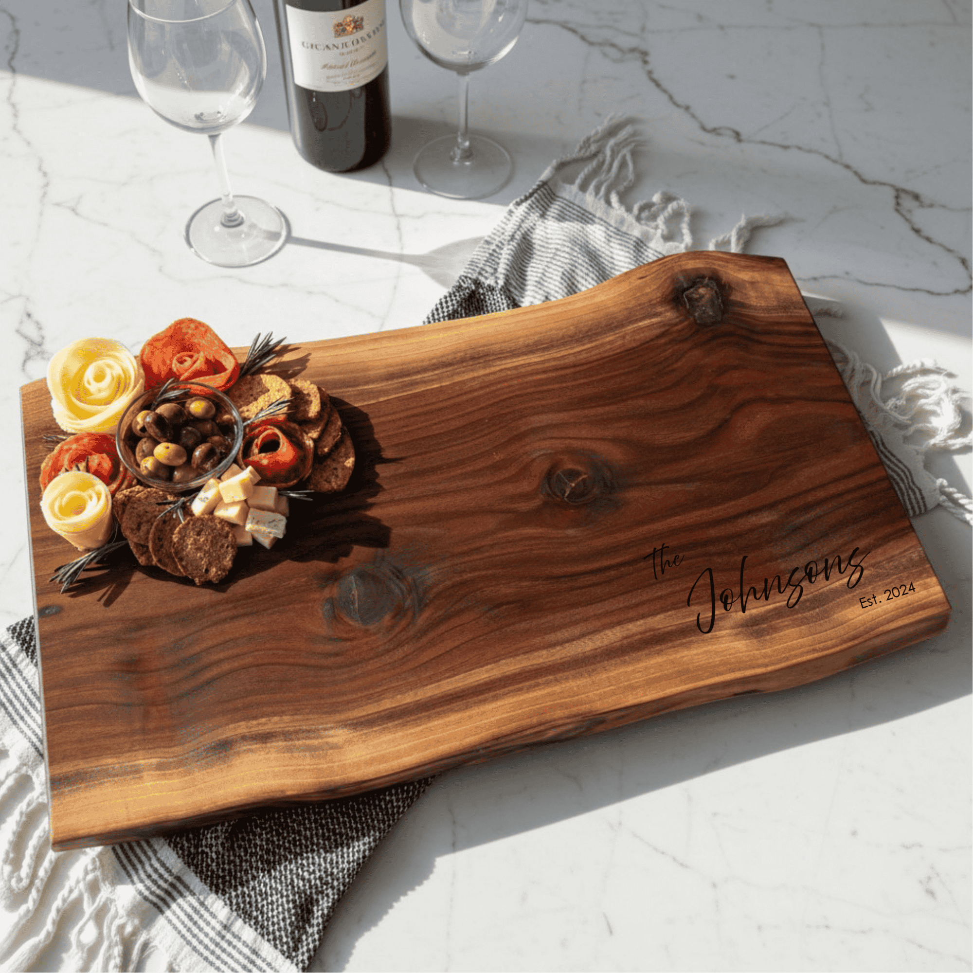 Personalized full natural live edge walnut charcuterie board with organic edge and custom engraving