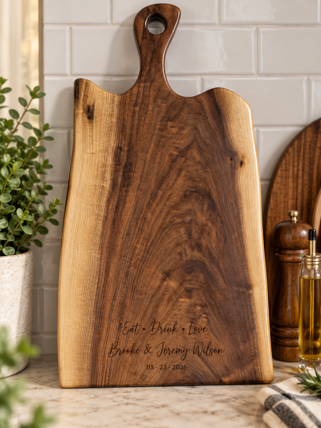 Personalized live edge walnut charcuterie board with handle and custom engraving