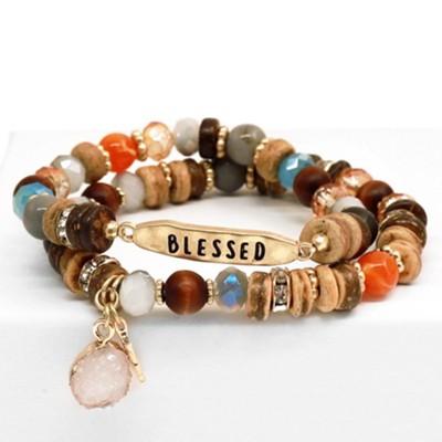 2 beaded bracelets with blessed written on one