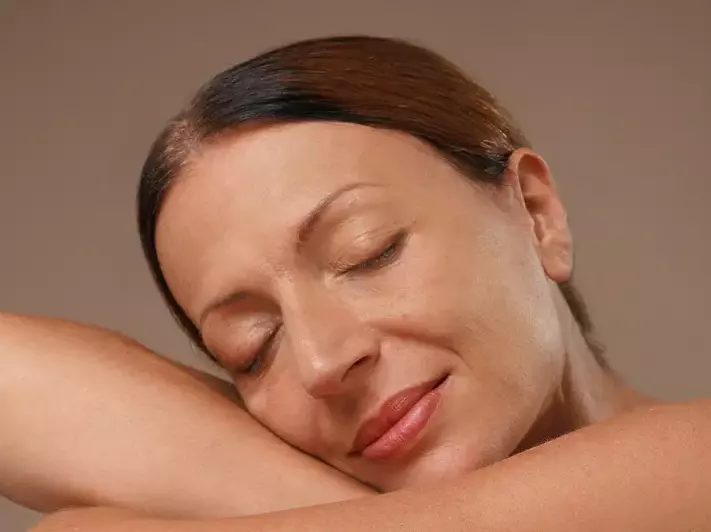 A woman with a smooth looking skin
