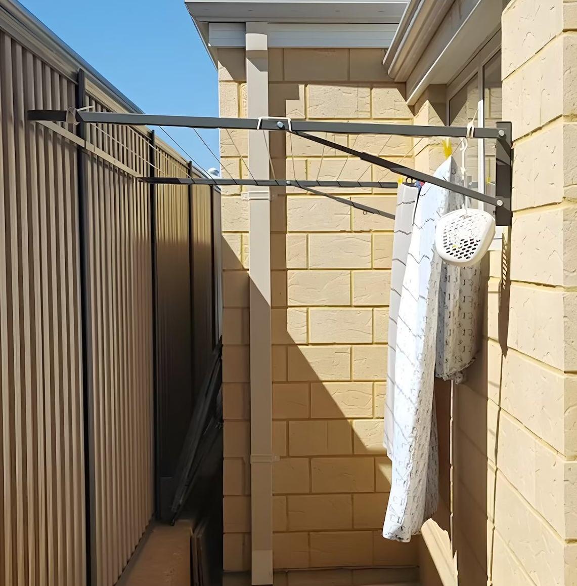 Best Clothesline Ideas for Small Spaces 4. Fold Down Clotheslines