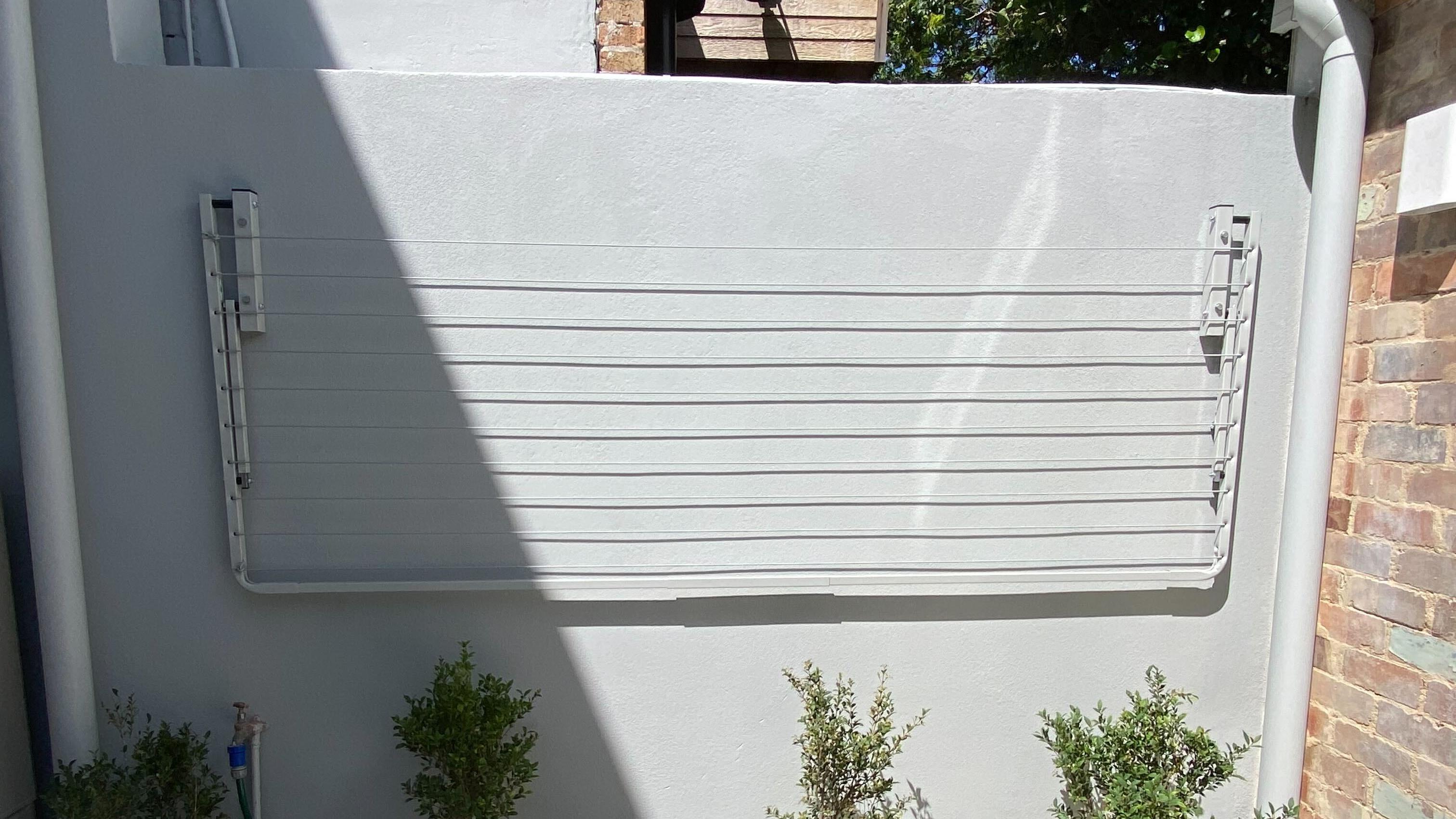 What Should You Consider Before Installing a Clothesline? 2. Attaching to Another Surface