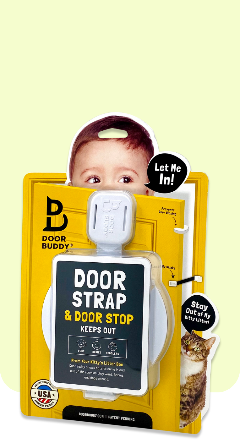 Door Buddy Door Strap and Door Stop retail packaging featuring a baby illustration saying Let Me In and a cat graphic saying Stay Out of My Kitty Litter. The packaging highlights that the adjustable door strap keeps dogs babies and toddlers out while allowing cats to enter and exit freely.