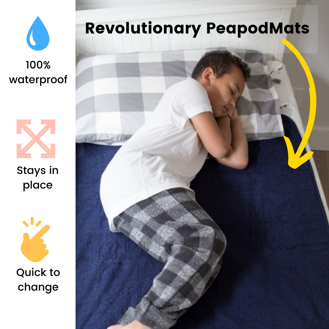boy sleeping on the bed with PeapodMat