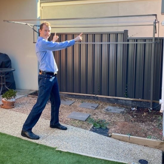 man with clothesline installed in eastern suburbs sydney