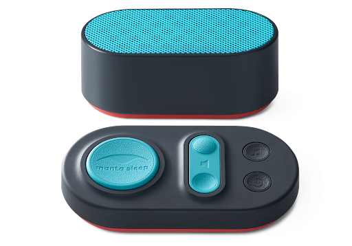 A white noise machine speaker and its control pad.