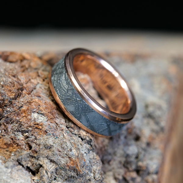 The Solid Gold Ring with Meteorite Inlay is a simple but unique gold meteorite ring