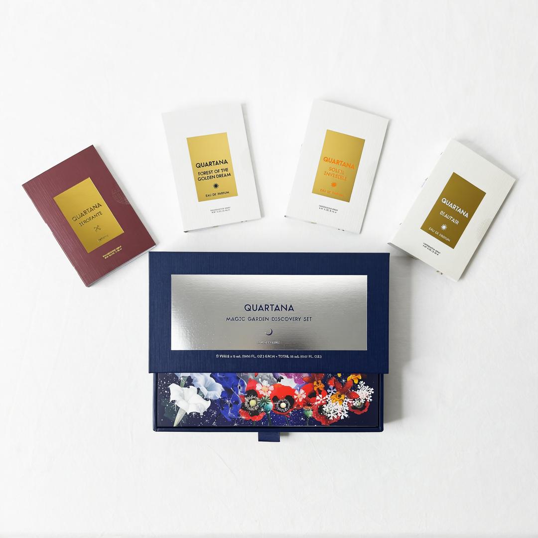 Quartana Complete Discovery Set shown with its blue slide box opened and several white sample cards arranged on a clean white background.