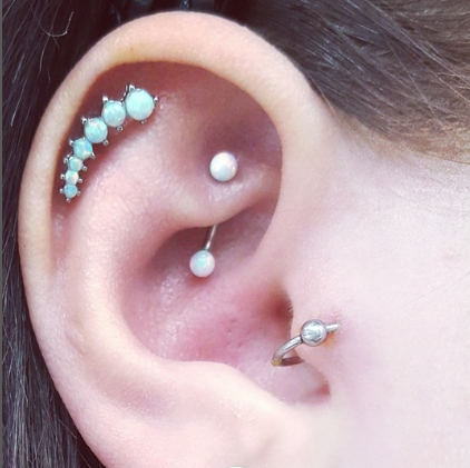 flat piercing rook piercing and tragus piercing