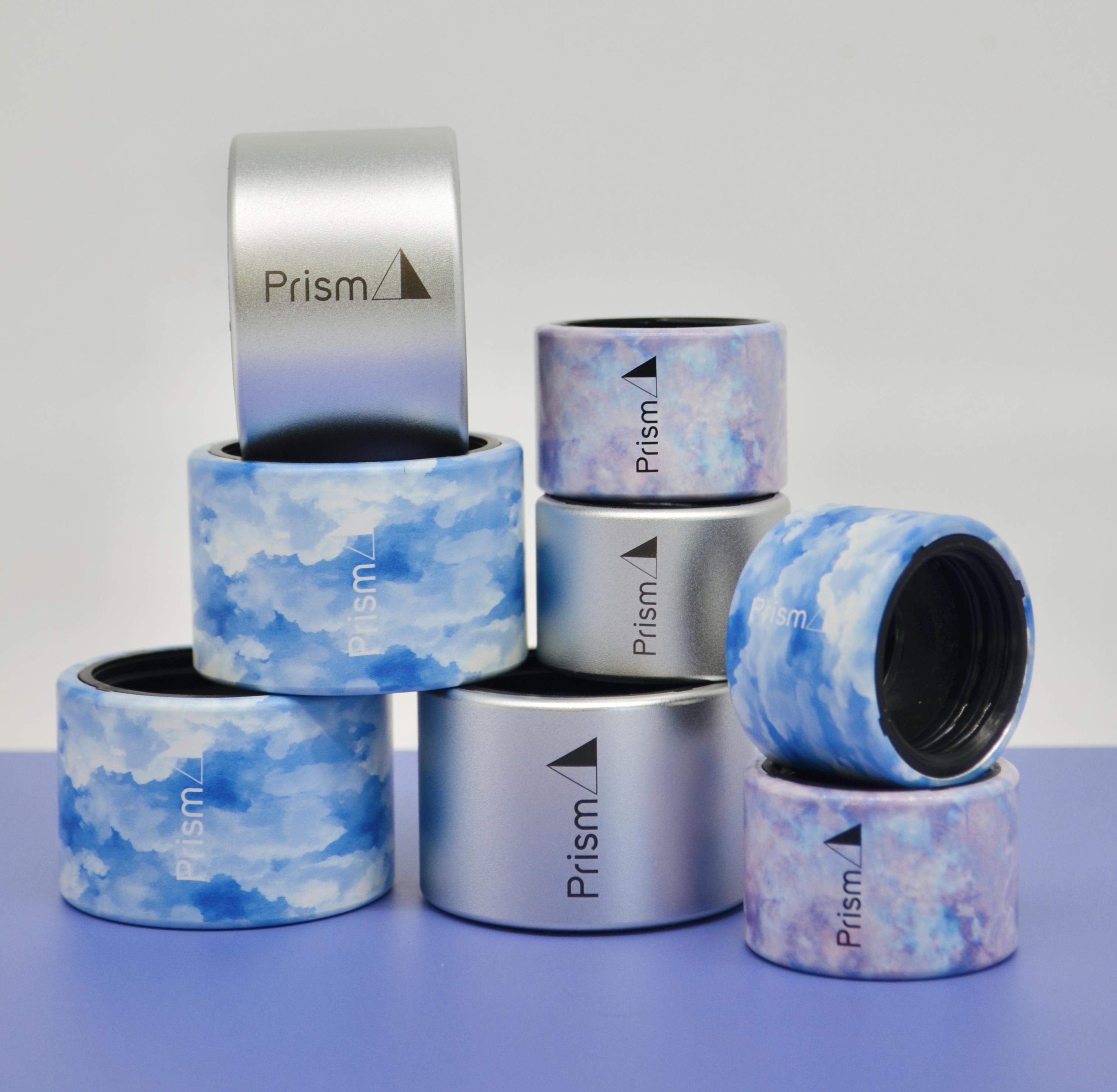 An image of three types of Prism Halo connectors, the cloud design, a silver design, and a tie-dye design