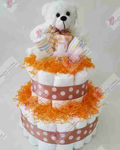 White bear on top of a cloth cake
