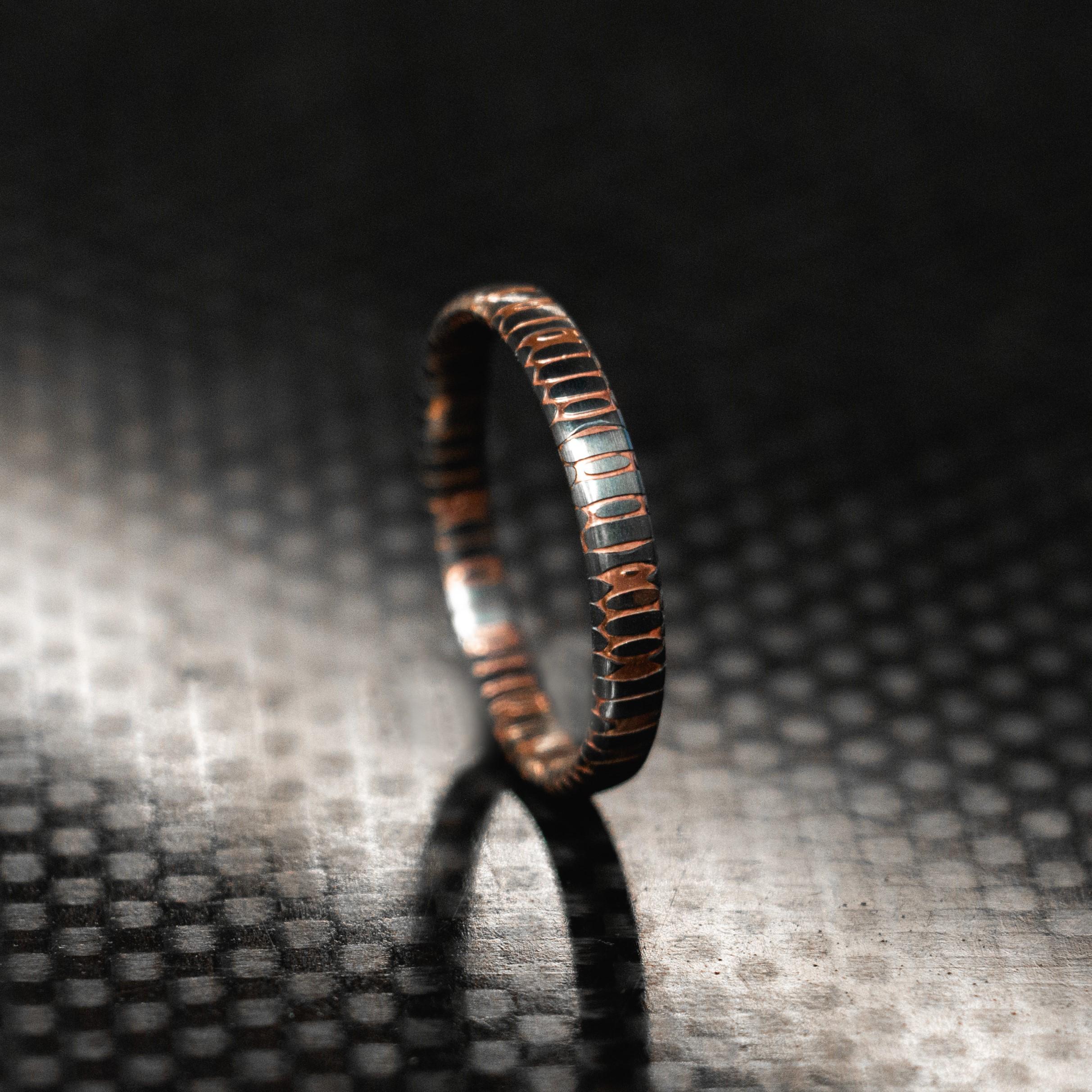 Superconductor mens wedding ring.