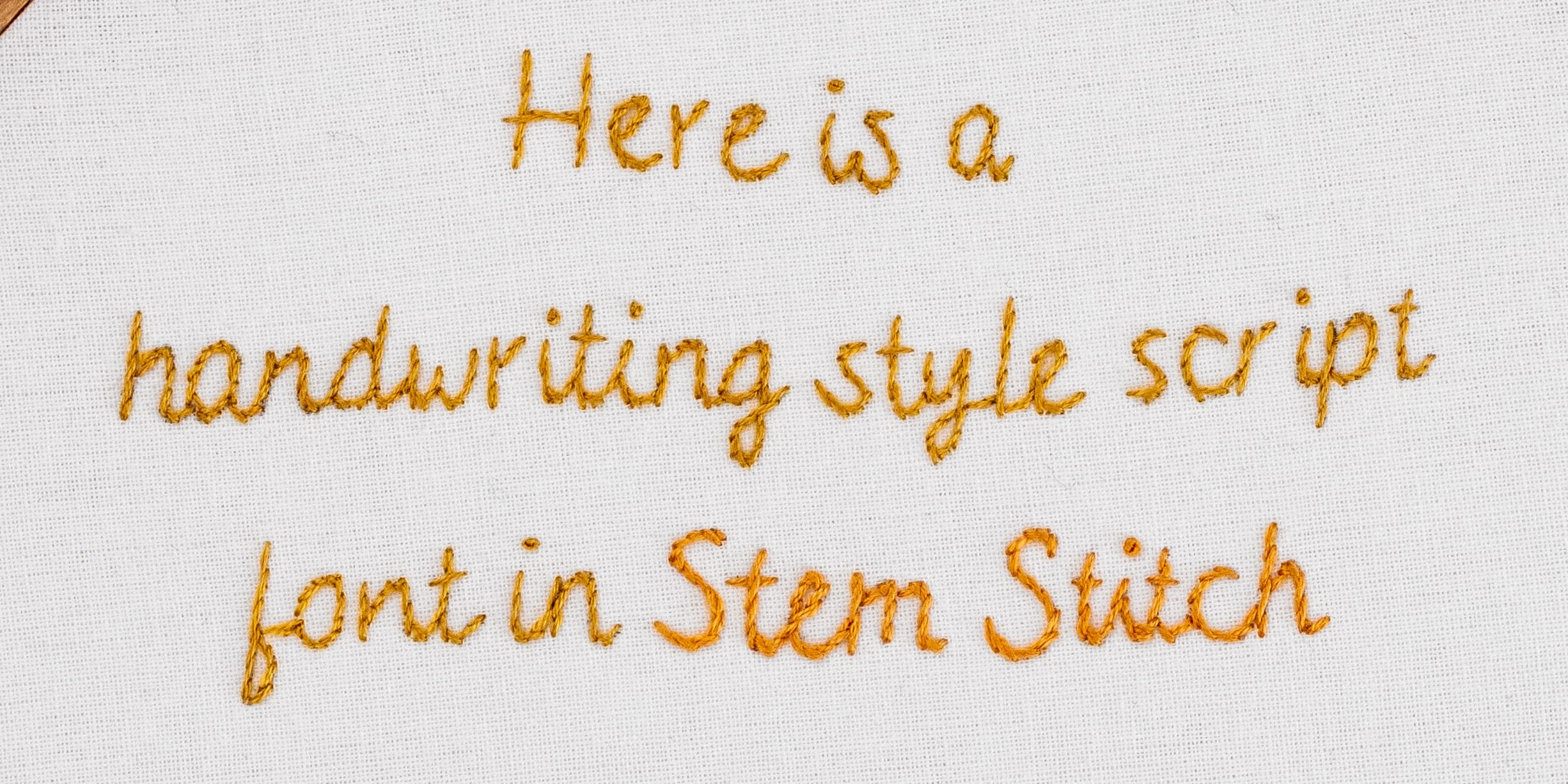 This is an image of a handwritten-looking script stitched in stem stitch.