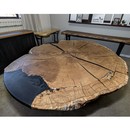 round live edge oak epoxy dining table with black epoxy