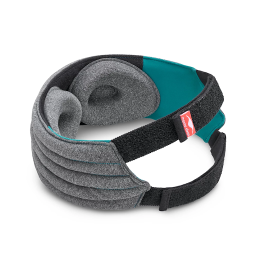 The rear view of a weighted eye mask for insomnia with two head straps and a pair of tapered eye cups attached to the mask’s interior.