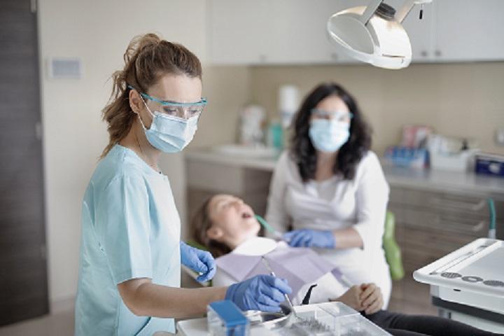 Dentist Working on a Patient