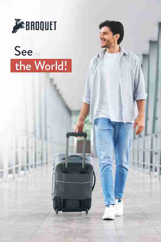 man holding a suitcase, smiling, broquet logo, text reads: See the World!
